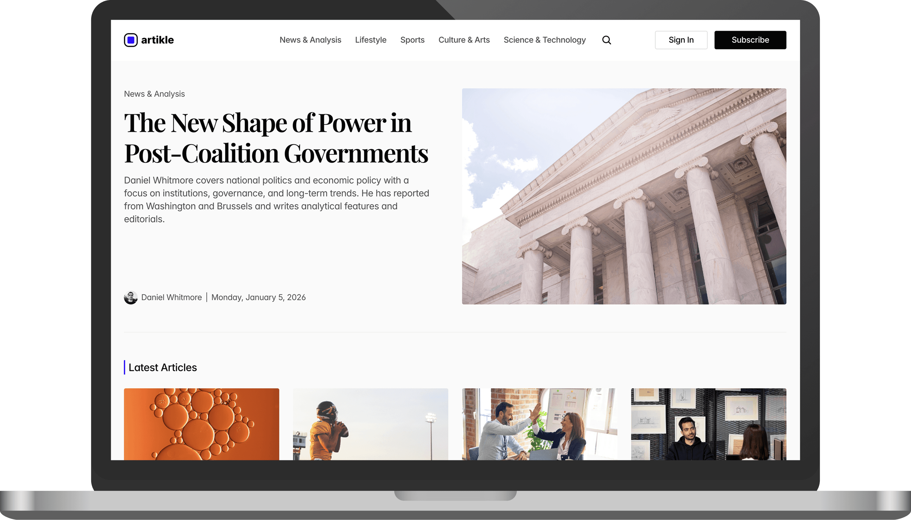 Artikle website presented on a laptop